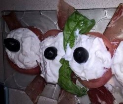Катък в домати с маслинки